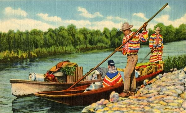 seminole indians in the florida everglades canoe